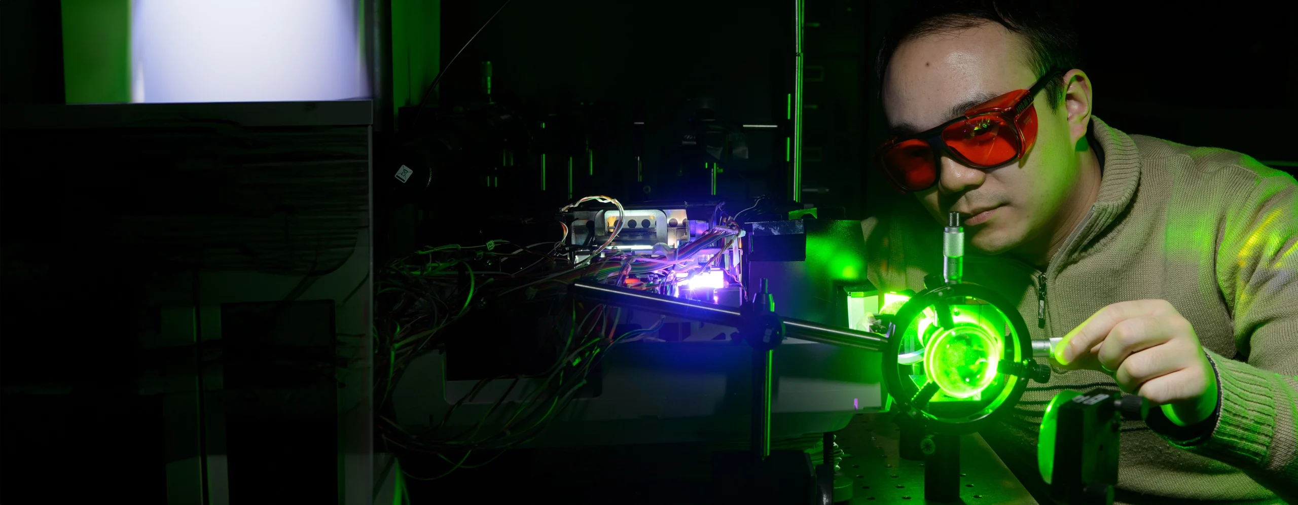 UConn Engineering Faculty working in lab.